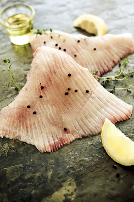 Fish and seafood: Raw ray wings with salt pepper lemon and thyme.